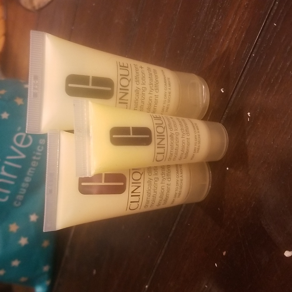 Three travel size Clinique dramatically different moisturizing lotion.